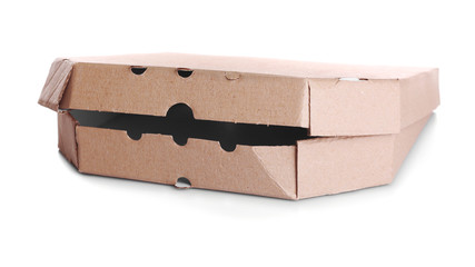 Cardboard pizza box isolated on white background, close up