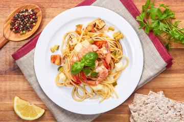pasta with shrimp, tomatoes, toast, lemon and herbs