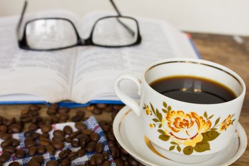 Book glasses and  coffee cup 