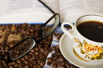 Book glasses and  coffee cup 