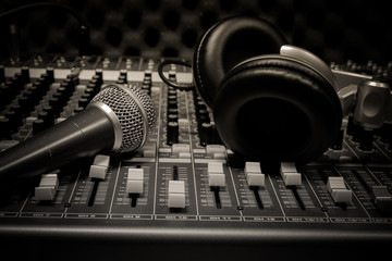 Obraz na płótnie Canvas microphone,headphone,sound mixer background.