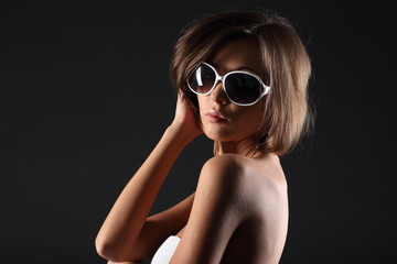 Beautiful girl on black background