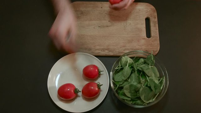 Add the Tomatoes in a Bowl of Spinach