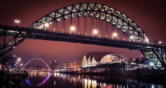 Newcastle Tyne bridge and Gateshead quayside at night