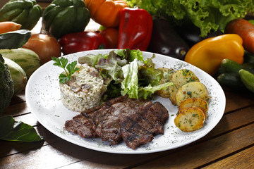 Rice with potatoes and meat.