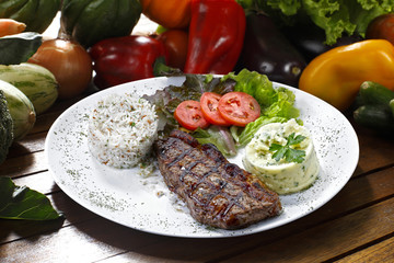 Grilled meat with trimmings