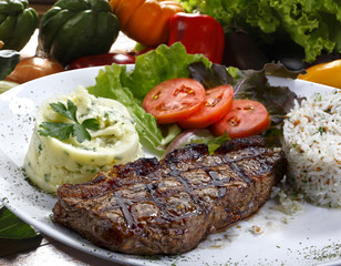 Grilled meat with trimmings