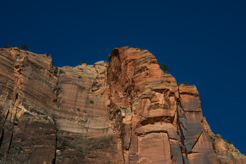 Rock Formation and Cliff Under Blue Sky in Zion National Park