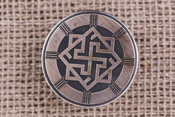 Perunitsa or Valkyrie. Charm, guarding the wisdom and justice, dignity, honor. 