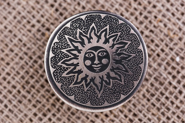 Sun. Image of the solar countenance. A symbol health and happiness