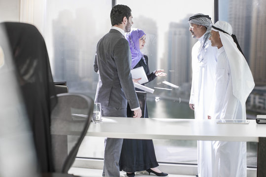 Western businessman meeting Middle Eastern businessmen