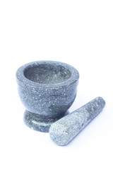 Stone mortar and pestle on white background