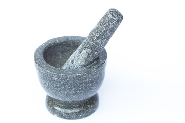 Stone mortar and pestle on white background