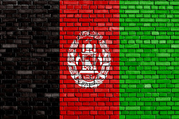flag of Afghanistan painted on brick wall