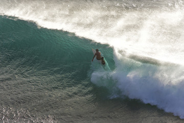 Surfing at Honoluoa Bay on Maui