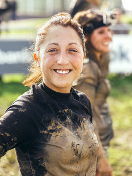 Participant in extreme obstacle race, portrait