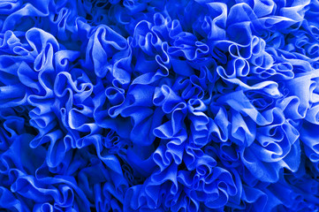 Bright beautiful  blue fabric flounces background