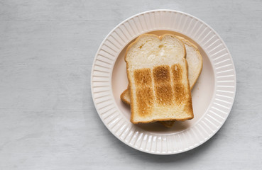 Fresh toast with space on grey wood background