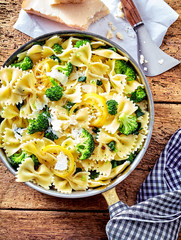 Broccoli parmesan cheese and pasta in pan