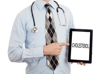 Doctor holding tablet - Cholesterol