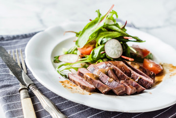 steak with salad