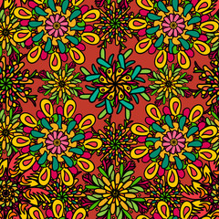 Seamless pattern with bright colorful drawn mandala flowers