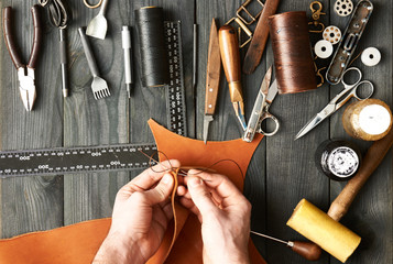 Man working with leather - 106760650