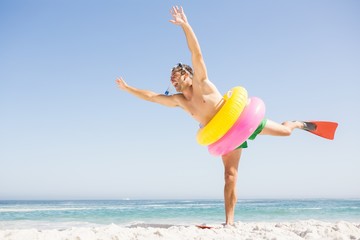 Smiling man posing with rubber ring