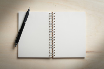 Notepad on wood table