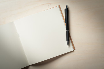 Notepad on wood table