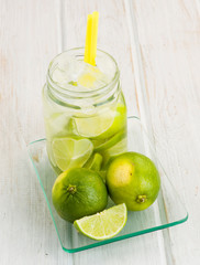 Pitcher refreshing drink with lime