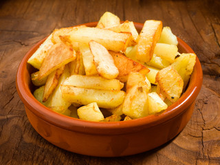 earthenware dish full of chips