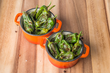 Roasted padron peppers in casserols