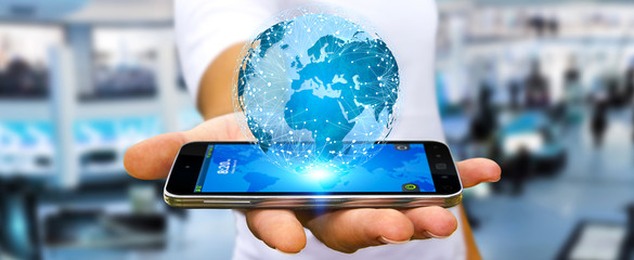 Businessman connecting different places of the world