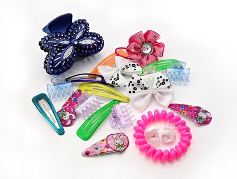 Various Hair Accessories For Young Girls On A White Background