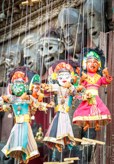 Souvenir Puppets hanging in the street of Nepal