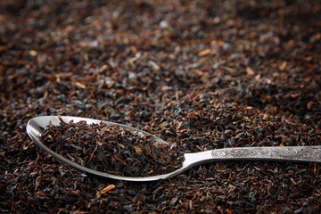 with loose tea spoon closeup
