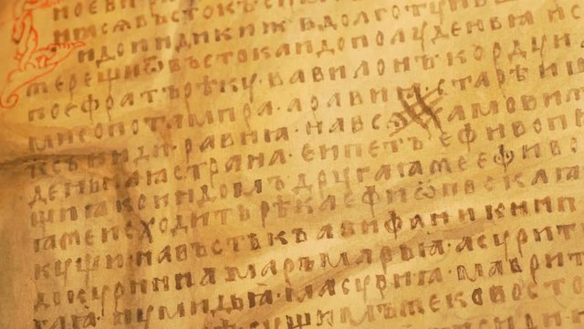 Old Opened Book on a Table Decorative Letters Yellow Ancient Manuscript Pages Tale of Bygone Years Primary Chronicle Slavs' History Nestor's Chronicle