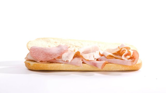 Series of different sandwiches being built.