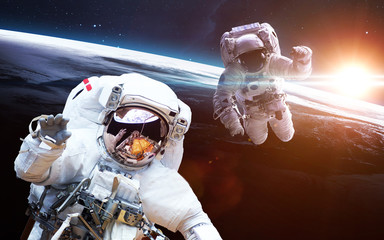 Astronaut in outer space. Spacewalk. Elements of this image furnished by NASA