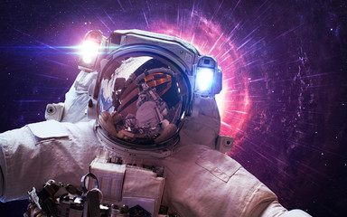 Astronaut in outer space. Spacewalk. Elements of this image furnished by NASA