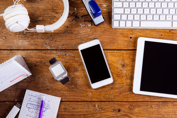 Desk, gadgets and office supplies. Flat lay. Copy space.
