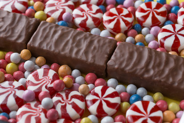 Candies colorful mix isolated background with copy space.