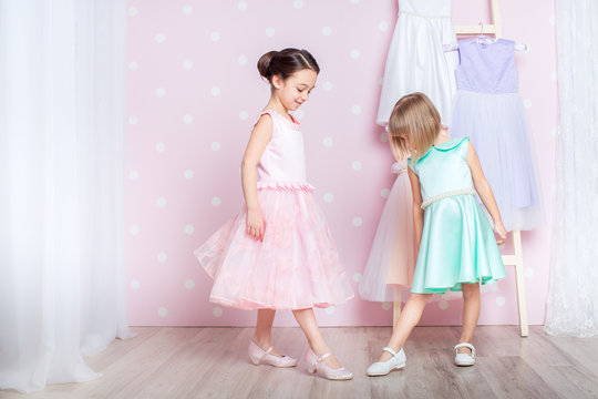 little girls dressed in princess
