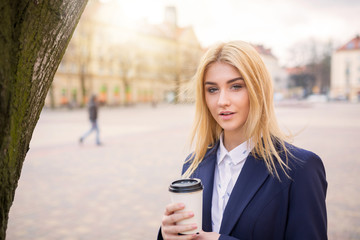Elegant woman with a cup of coffee