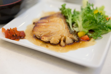 grilled bluefish serving with vegetable
