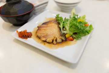 grilled bluefish serving with vegetable