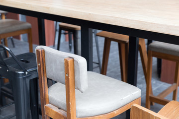 brown wooden table with stool