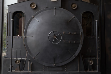 front of old vintage train