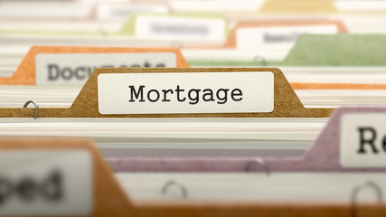 Mortgage on Business Folder in Multicolor Card Index. Closeup View. Blurred Image. 3D Render.